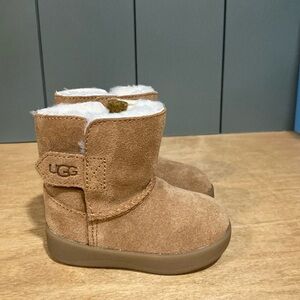 UGG shoes. Like new. Very clean. Size 2/3. Color is chestnut